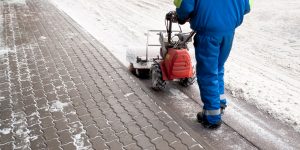 Commercial Snow Removal employee